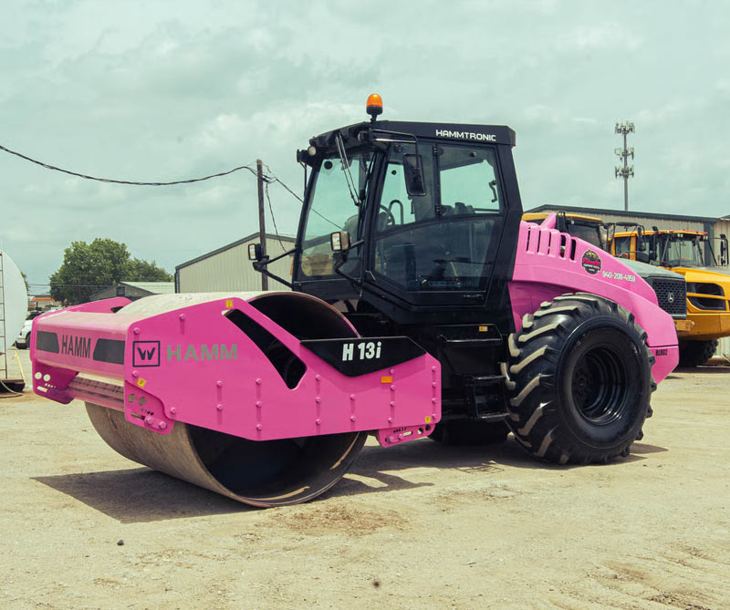 Infrastructure and Civil Engineering Rental Drum Roller in yard in Justin Texas