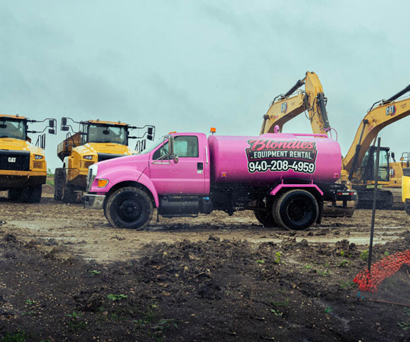 Infrastructure and Civil Engineering Rental Water Truck in yard in Justin Texas